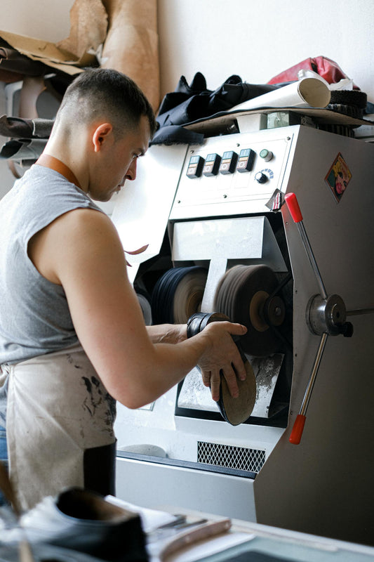 European shoemaker at workbench — made-to-order leather shoes