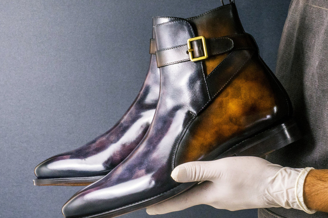Jodhpur boot held in gloved hands, Main Collection